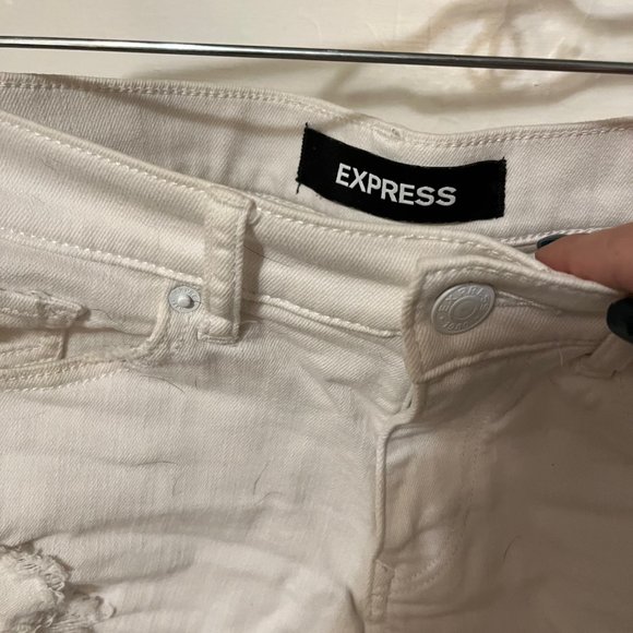 Express Distressed High Waisted Raw Hem Cutoff Denim Shorts in White - Picture 2 of 3